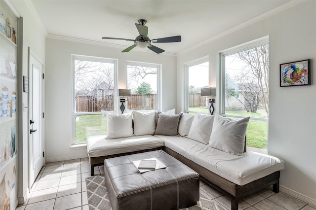 sunroom with a ceiling fan