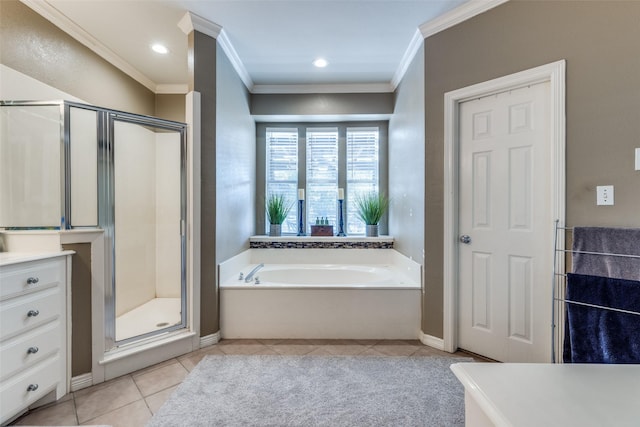 full bathroom featuring a garden tub, crown molding, a shower stall, and tile patterned flooring