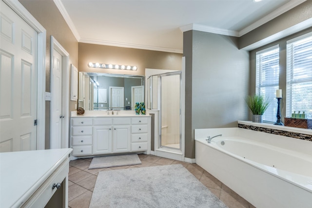 full bath featuring crown molding, a stall shower, a bath, tile patterned floors, and vanity