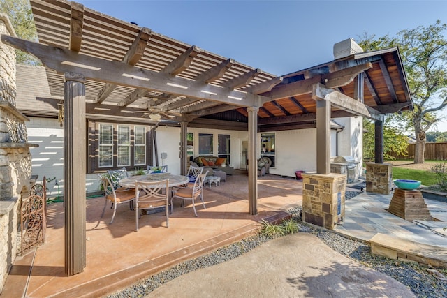 view of patio / terrace with area for grilling, outdoor dining area, a pergola, and an outdoor kitchen