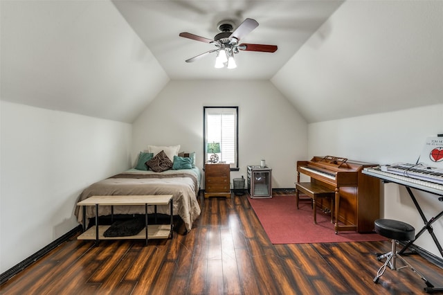 bedroom with ceiling fan, baseboards, lofted ceiling, and wood finished floors