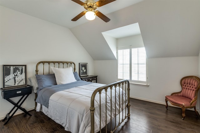 bedroom with vaulted ceiling, ceiling fan, baseboards, and wood finished floors