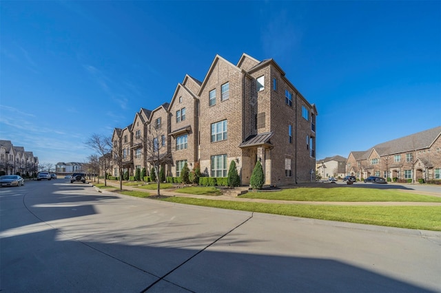 view of building exterior with a residential view