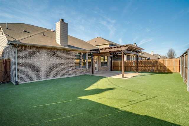 back of property featuring a pergola, a patio, a fenced backyard, brick siding, and a chimney