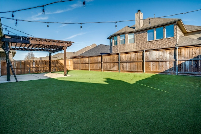 view of yard featuring a patio area, a fenced backyard, and a pergola