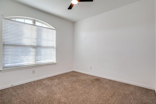 carpeted empty room with ceiling fan