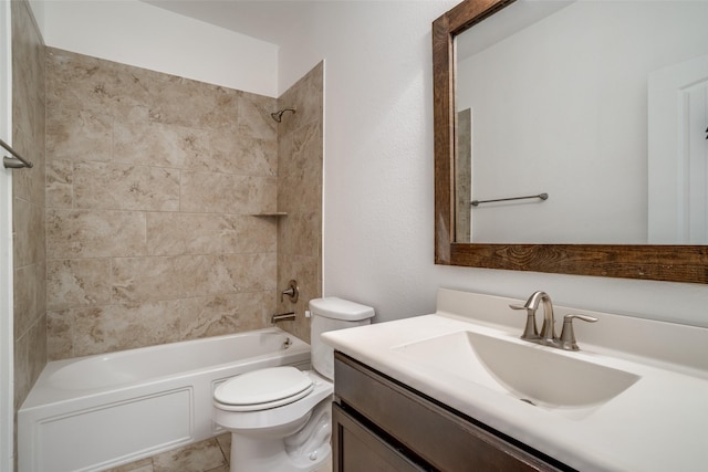 full bathroom featuring tile patterned floors, toilet, vanity, and washtub / shower combination