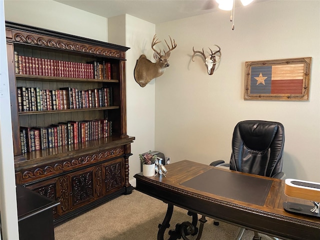 office space with carpet flooring and ceiling fan