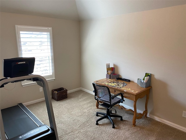 office with carpet flooring, baseboards, and vaulted ceiling