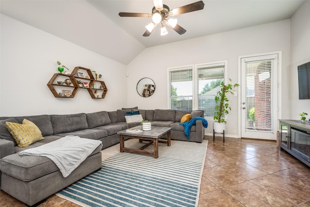 living room with light tile patterned floors, lofted ceiling, and ceiling fan