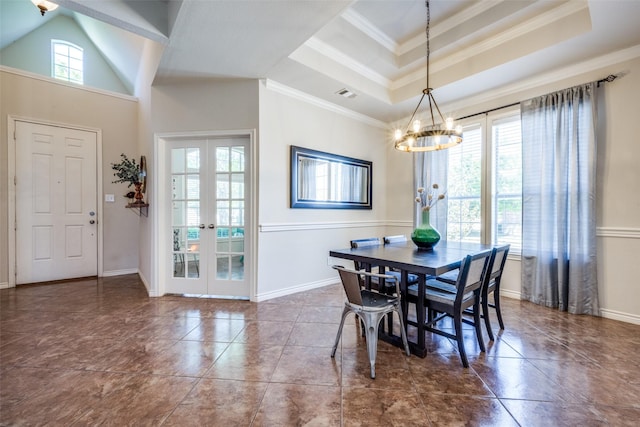 dining room with visible vents, an inviting chandelier, crown molding, french doors, and a raised ceiling