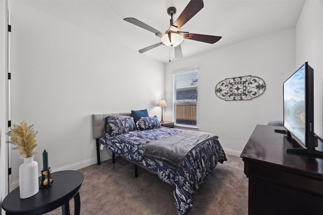 carpeted bedroom featuring ceiling fan and baseboards