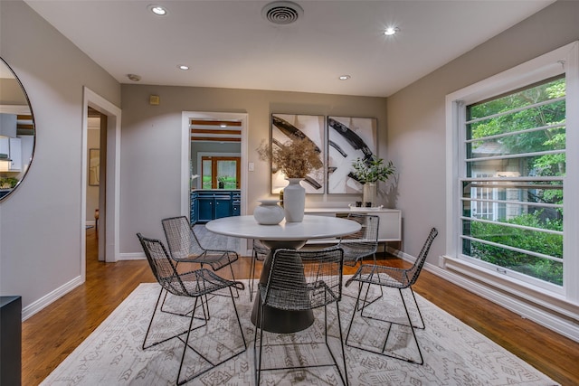 1311 Cedar Hill Ave, Dallas, TX 75208 - dining space with healthy amount of natural light, recessed lighting, baseboards, and wood finished floors