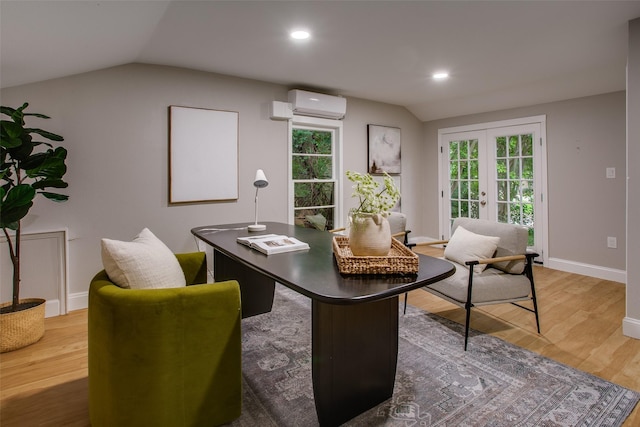 1311 Cedar Hill Ave, Dallas, TX 75208 - office featuring a wall mounted air conditioner, vaulted ceiling, french doors, wood finished floors, and baseboards