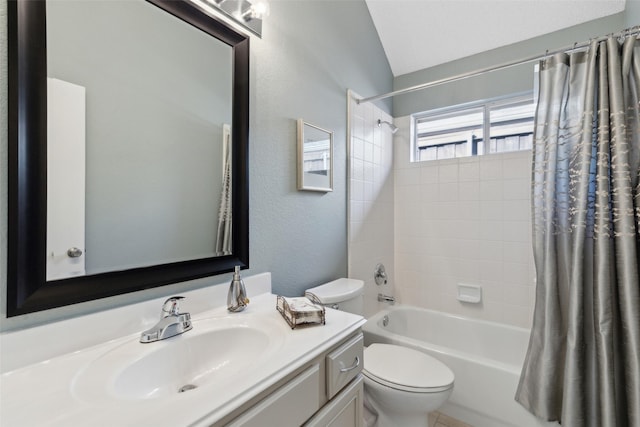 bathroom with shower / bath combination with curtain, toilet, vanity, and a textured wall