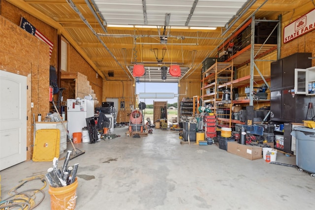 garage featuring water heater