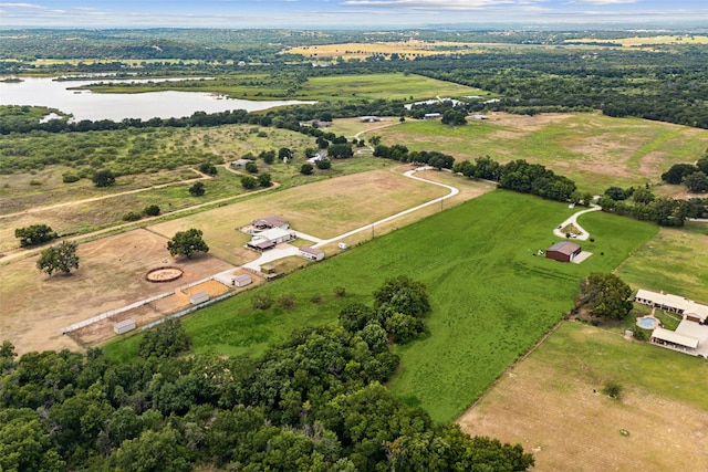 aerial view with a rural view and a water view