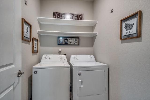 laundry room with laundry area and separate washer and dryer