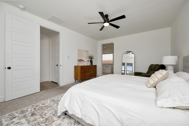 bedroom with visible vents, carpet flooring, a ceiling fan, and baseboards