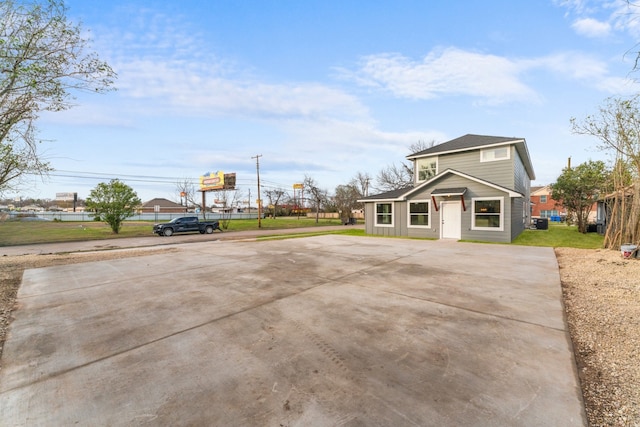 exterior space with a front lawn