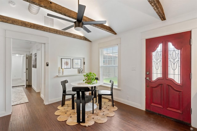 dining area featuring lofted ceiling with beams, visible vents, dark wood-style flooring, and ceiling fan