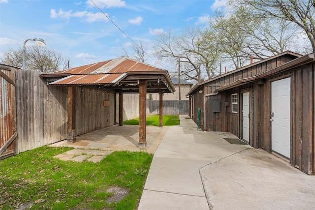 exterior space with a gazebo and a fenced backyard