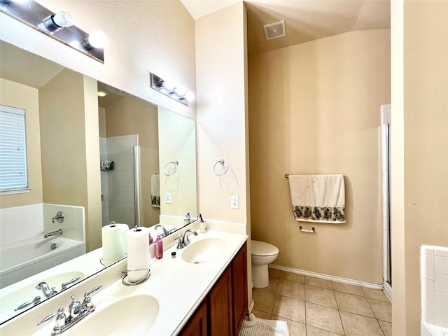 full bathroom with a sink, visible vents, a garden tub, and a shower stall