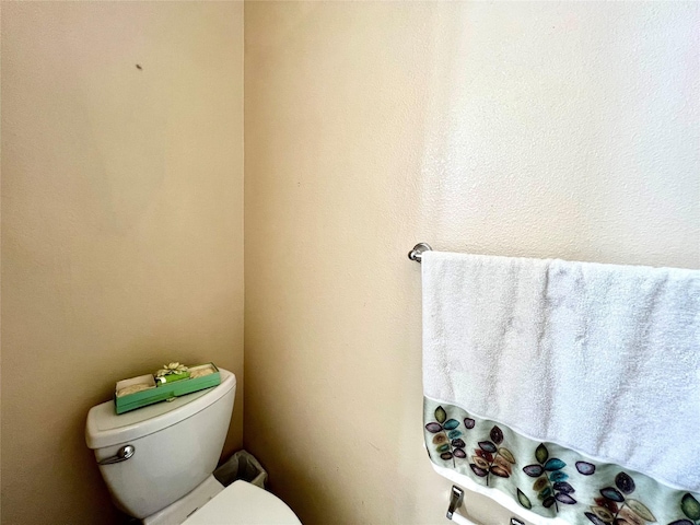 bathroom featuring toilet