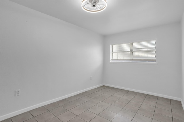 empty room with baseboards
