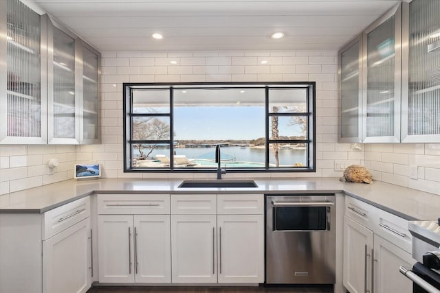 8917 Random Rd, Fort Worth, TX 76179 - kitchen with recessed lighting, a sink, backsplash, and dishwasher