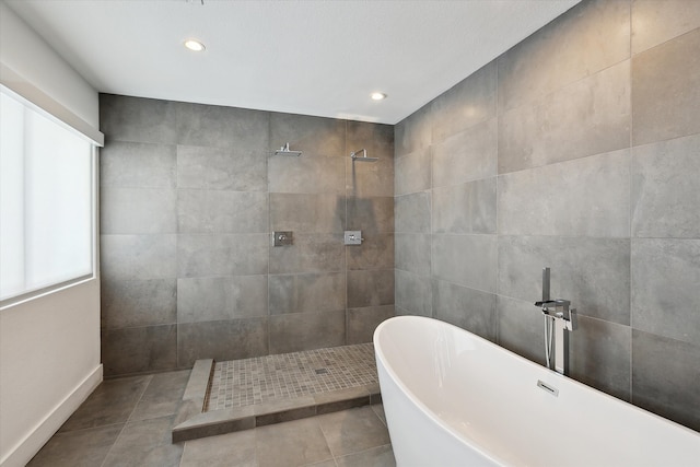 8917 Random Rd, Fort Worth, TX 76179 - full bath featuring a freestanding bath, tile patterned floors, walk in shower, and recessed lighting