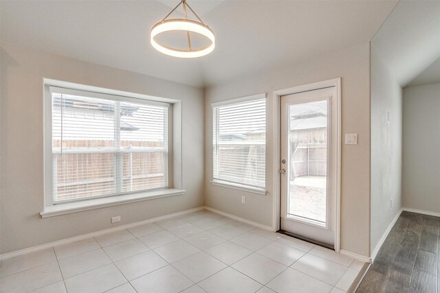 6328 Red Cliff Dr, Fort Worth, TX 76179 - unfurnished dining area featuring baseboards
