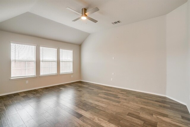 6328 Red Cliff Dr, Fort Worth, TX 76179 - spare room featuring a ceiling fan, dark wood-type flooring, lofted ceiling, and baseboards