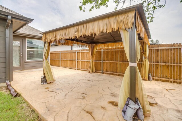 6328 Red Cliff Dr, Fort Worth, TX 76179 - view of patio / terrace featuring a fenced backyard and a gazebo