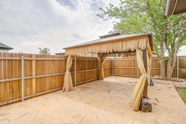 6328 Red Cliff Dr, Fort Worth, TX 76179 - view of patio with a gazebo and a fenced backyard