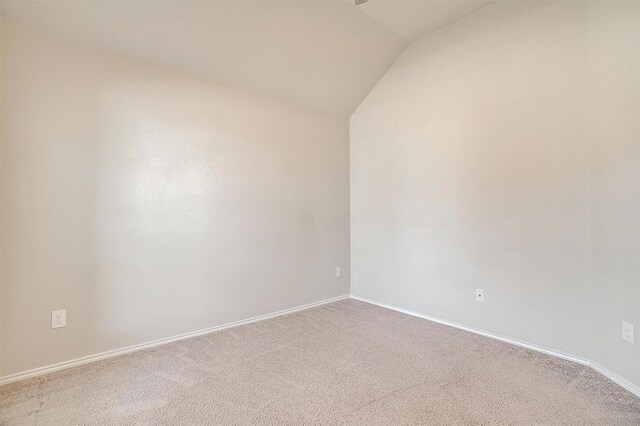 6328 Red Cliff Dr, Fort Worth, TX 76179 - carpeted empty room with lofted ceiling and baseboards