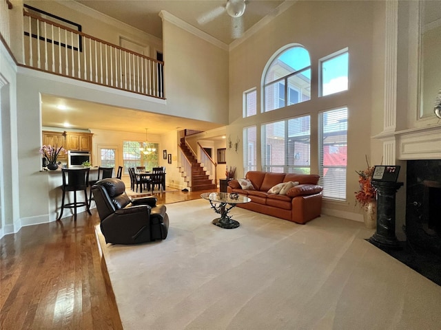 2956 Lago Vista Ln, Rockwall, TX 75032 - tiled dining space featuring a chandelier, baseboards, crown molding, and healthy amount of natural light