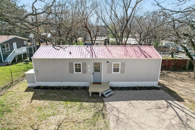 88 Live Oak St, Alvarado, TX 76009 - manufactured / mobile home with a front yard, fence, and metal roof