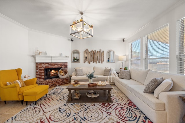 tiled living room with a chandelier, a fireplace, and ornamental molding