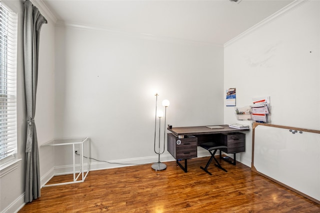 office area with baseboards, wood finished floors, and crown molding