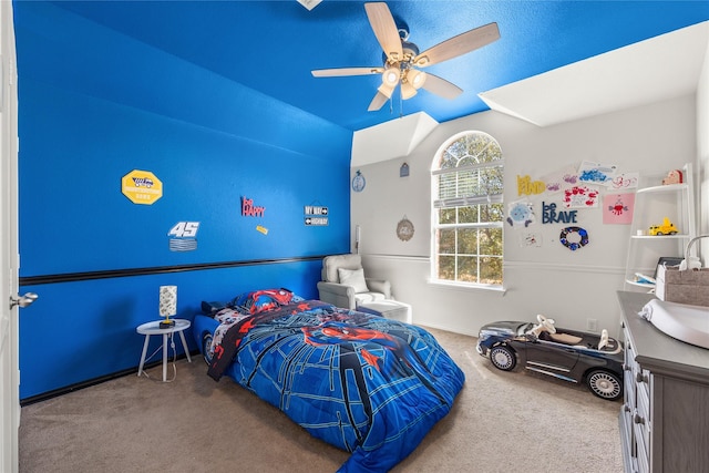 bedroom featuring lofted ceiling, ceiling fan, and carpet floors