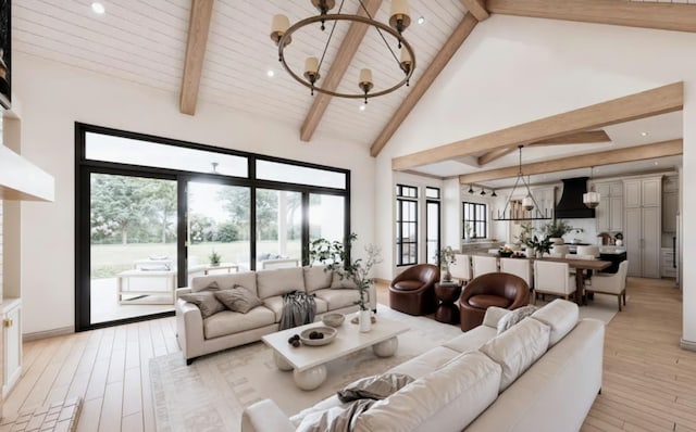 189 Caddo Trl, Corsicana, TX 75109 - living area with an inviting chandelier, plenty of natural light, beam ceiling, and light wood-type flooring