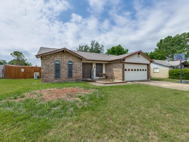 single story home featuring a garage, a front lawn, brick siding, and driveway