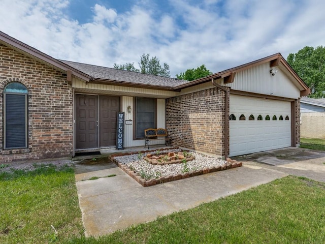 view of front of property with driveway, brick siding, and an attached garage