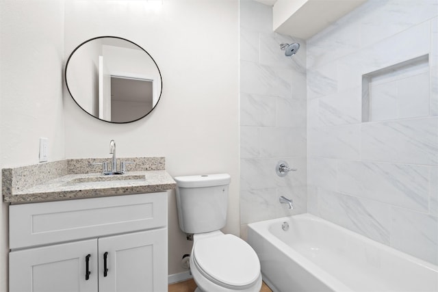 full bathroom with vanity, shower / tub combination, and toilet