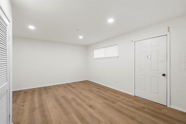 interior space with recessed lighting, light wood-style floors, and baseboards