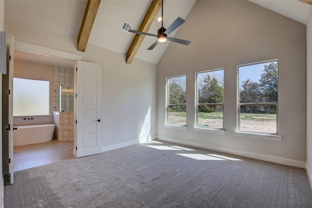 unfurnished bedroom with high vaulted ceiling, carpet, baseboards, beam ceiling, and visible vents
