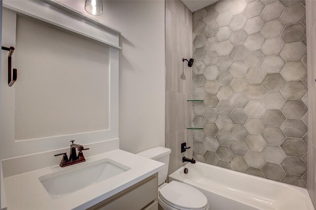 full bathroom with toilet and vanity