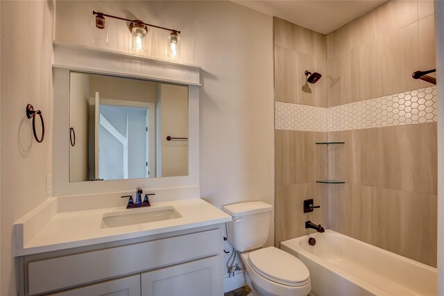 bathroom featuring tub / shower combination, toilet, and vanity