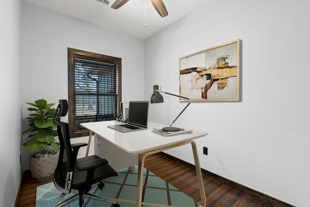 office with visible vents, baseboards, wood finished floors, and ceiling fan